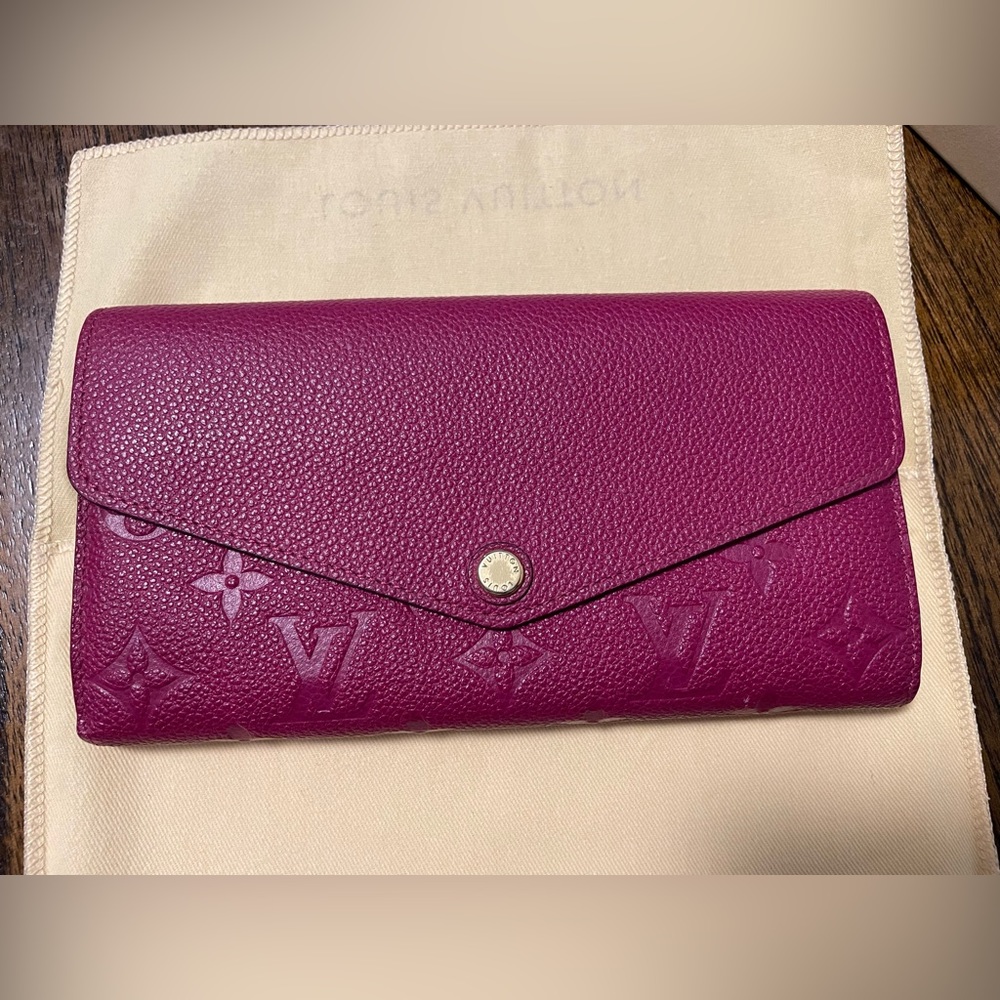 Like New Louis Vuitton Sarah Wallet in Purple/pink 
Monogram Empreinte Leather